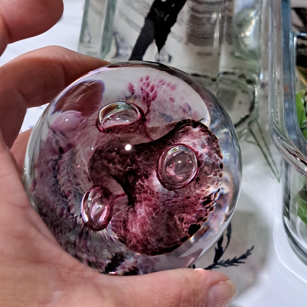 Elegant Glass Art Sphere with Pink Accents